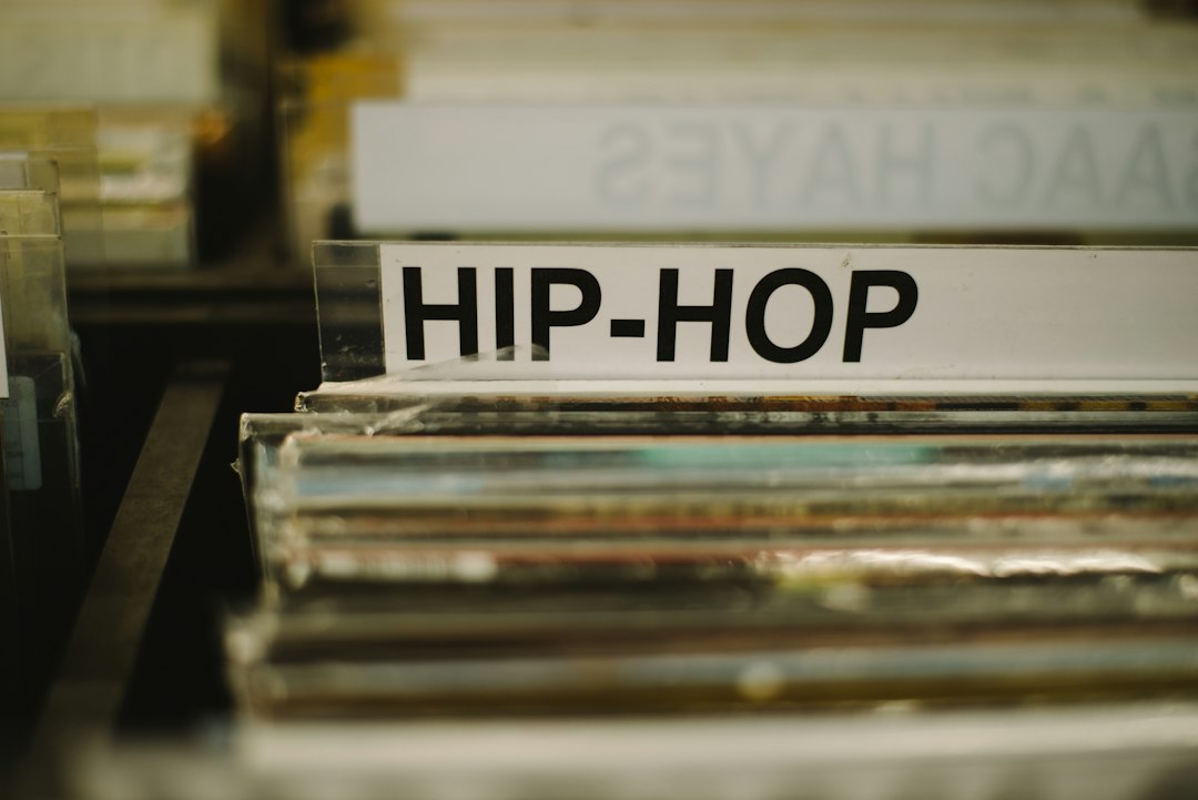 Stack of vintage records, illustrating Ja Rule's Pain Is Love 25th anniversary